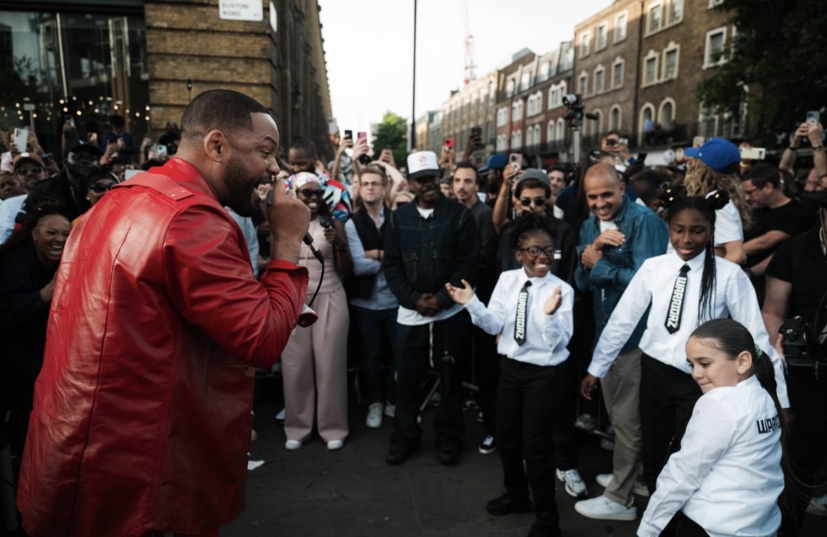 Will Smith at King's Cross with the Warriorz dancers, who learned the routine in twenty-four hours